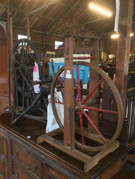 2 spinning wheels and a spinning spindle